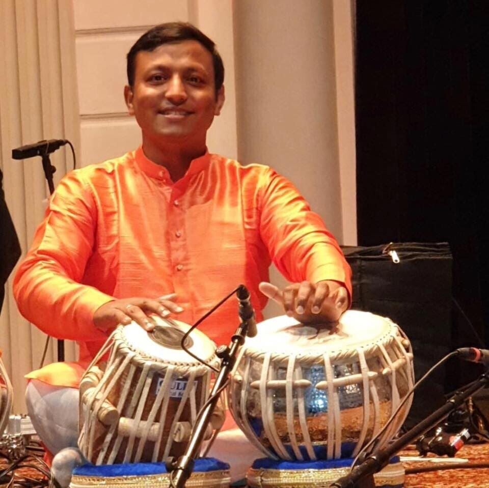 Imran Khan performing tabla