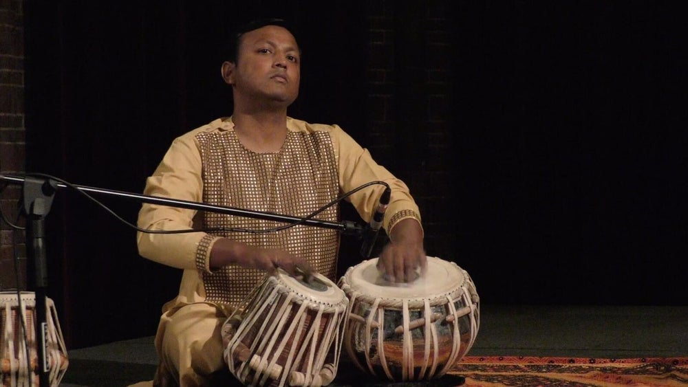 Imran Khan performing tabla