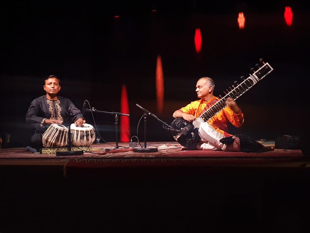 Imran Khan performing tabla