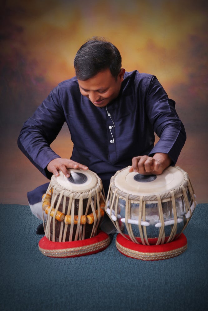 Imran Khan performing tabla